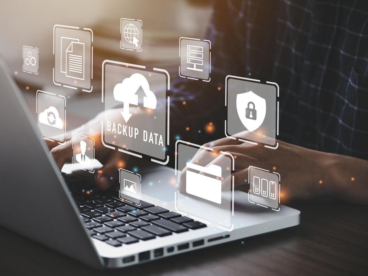 Businessman using a computer to backup storage data Internet technology concept for backup online documentation database and digital file storage system or software,file access, doc sharing.